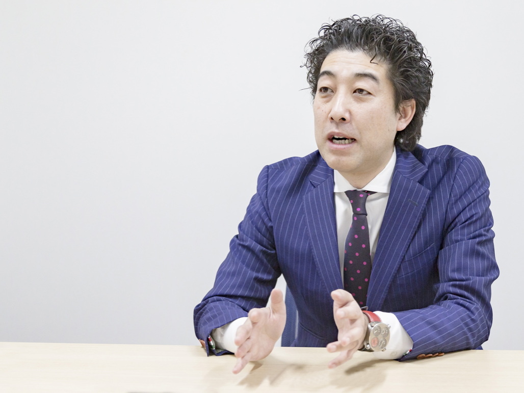 写真:関東パック株式会社 総務課 課長 斎藤 学 様