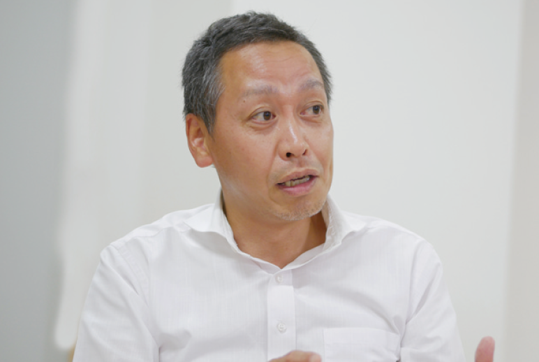 写真:株式会社SJC ソリューション事業部 第一ソリューション部 次長 触沢 昇 様