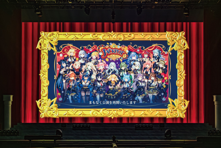 カラフルなメインビジュアルや、イベントのテーマカラーでもある赤色の幕を繊細に描写。